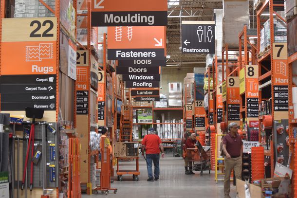 Customers shop at a Home Depot store in Arlington, Virginia, on March 14, 2024.
