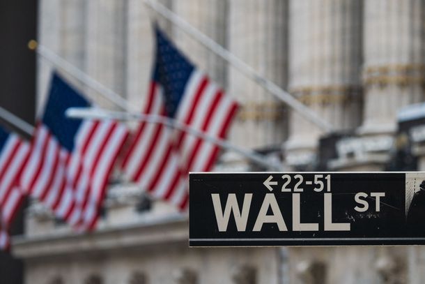 A Wall Street sign at the New York Stock Exchange (NYSE)